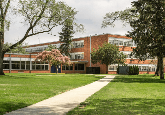 Exterior of a K-12 school building representing GGI's focus on healthy, energy-efficient learning environments